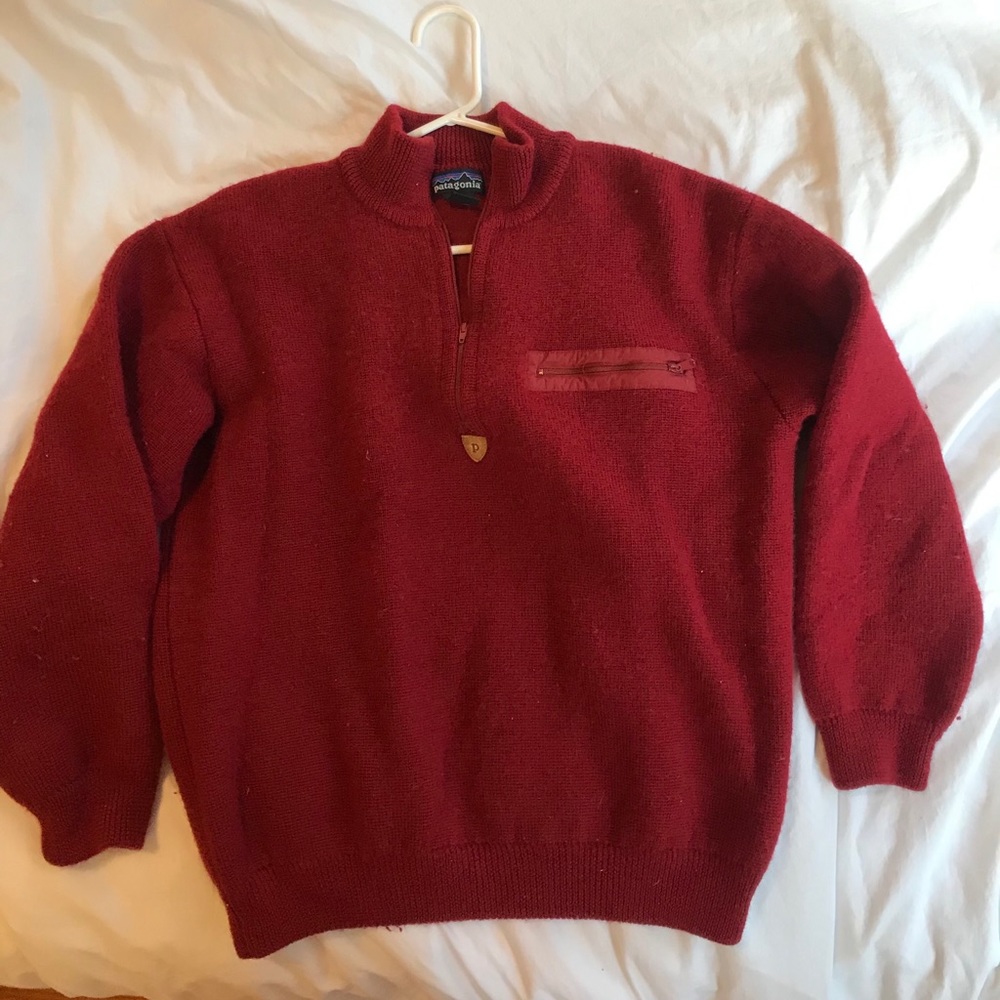 Patagonia red wool pull over quarter zip.